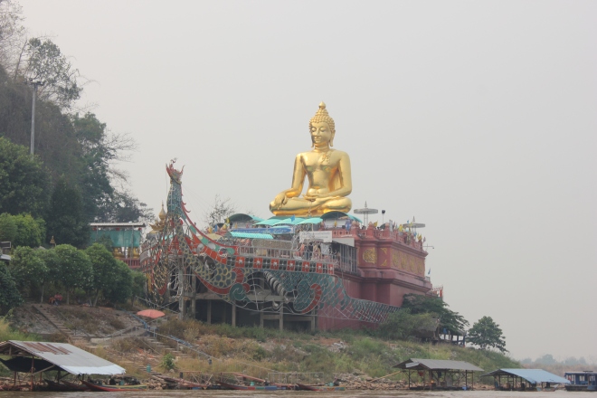 Golden Buddha on the Thai bank of the Mekong River.